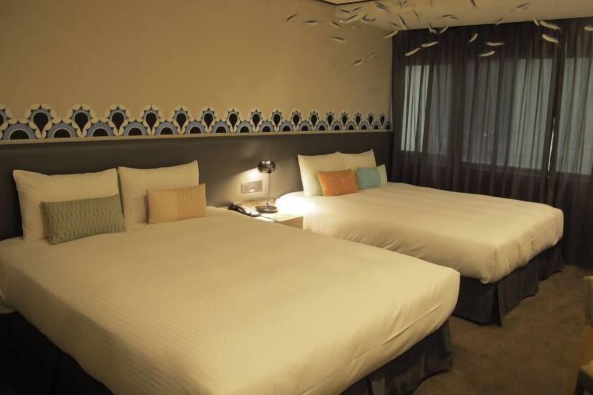 Premium bedding, down comforters, in-room safe, soundproofing