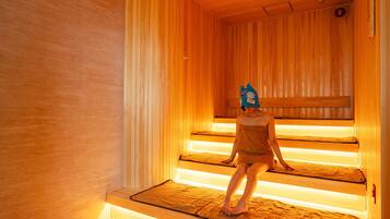 A sauna with wooden walls and benches.