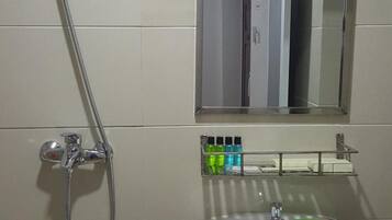 Shower, free toiletries, hair dryer, slippers