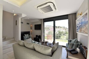 Suite One Bedroom Split Level with Sharing Pool and Mountain View | Coin séjour