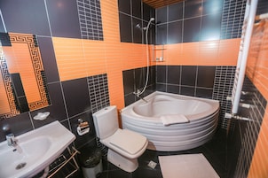 Deluxe Double or Twin Room, City View | Bathroom | Free toiletries, hair dryer, slippers, towels