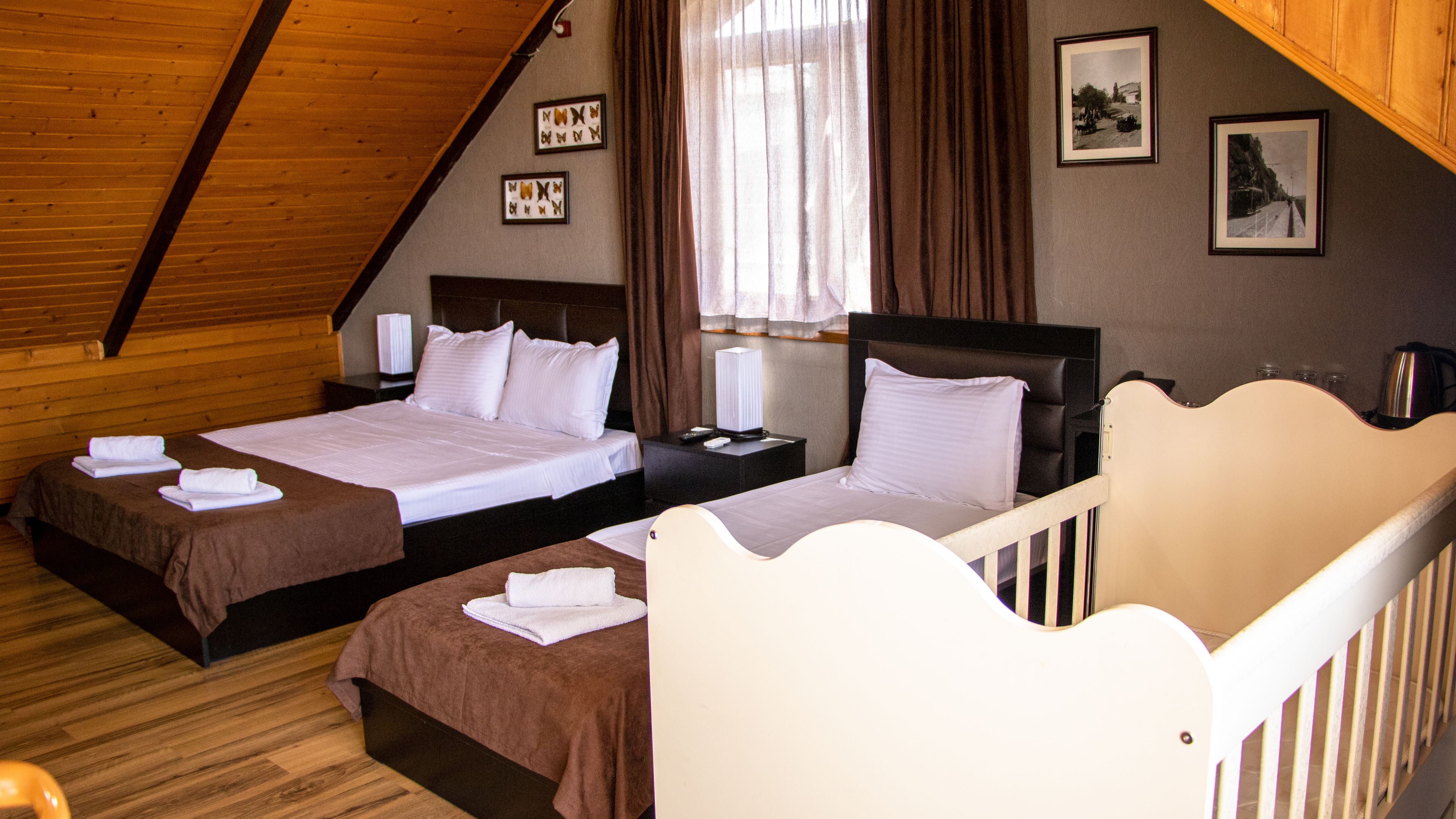 panoramic suite, 1 bedroom, non smoking, city view | minibar, individually decorated, desk, blackout curtains