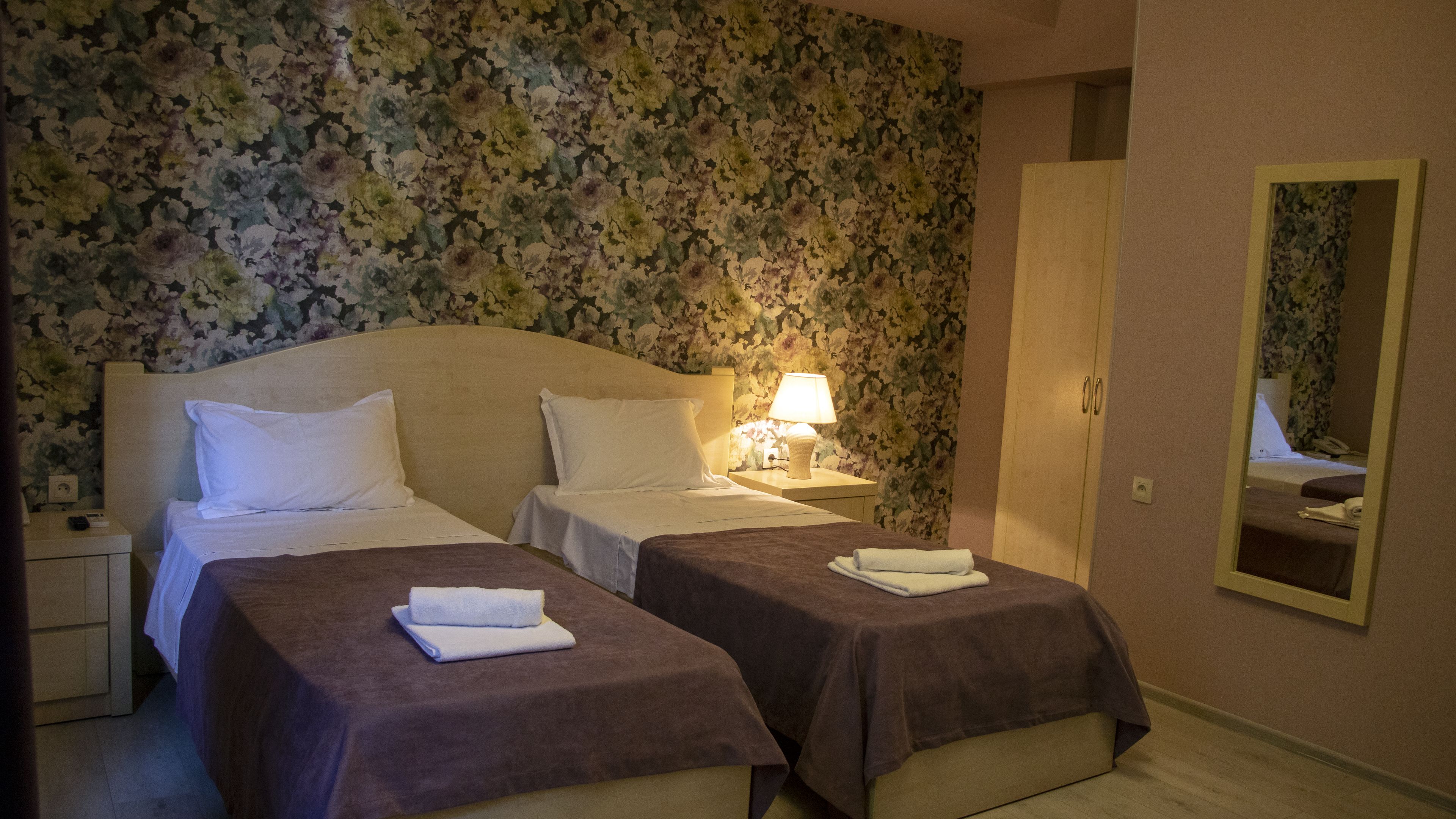 standard twin room | minibar, individually decorated, desk, blackout curtains