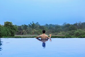 Outdoor pool, open 6:00 AM to 8:00 PM, sun loungers