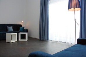Business Apartment, 2 Bedrooms (2 Twin Beds/ Box-Spring Beds 1.80m + 1 Sofabed 1.80m for 2 people )  | Living room
