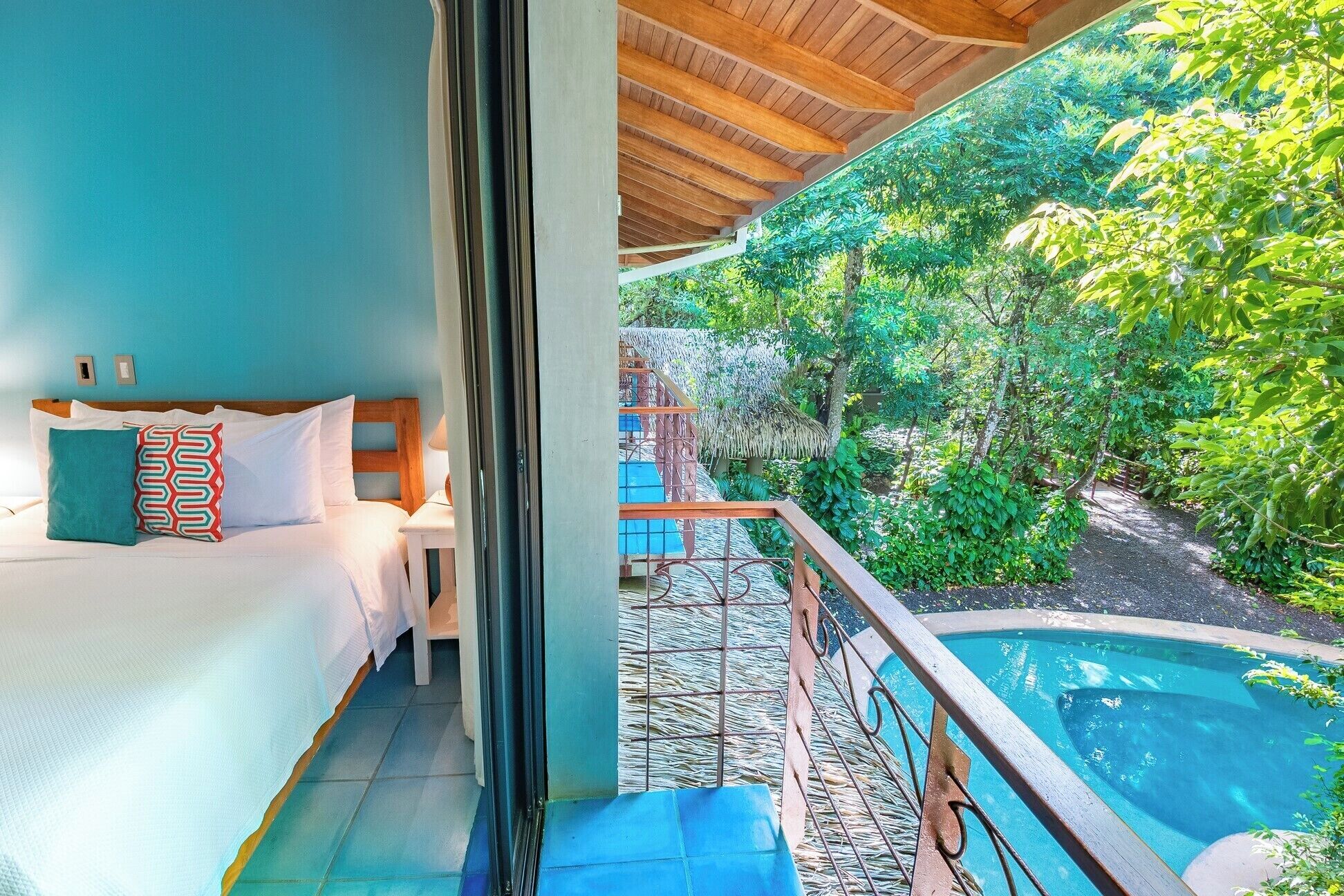 premium suite, pool view | hypo-allergenic bedding, pillow-top beds, in-room safe