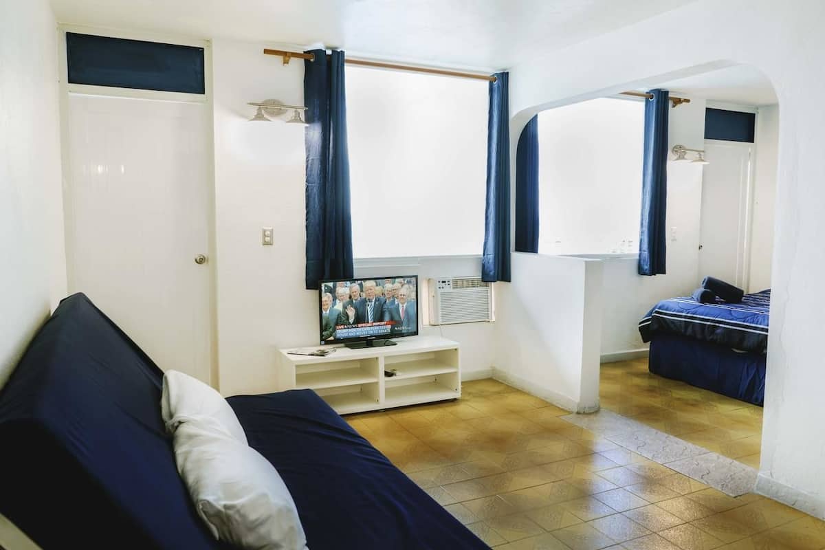 Habitación Deluxe, cocina básica, vistas al mar | Wifi gratis y accesible en silla de ruedas