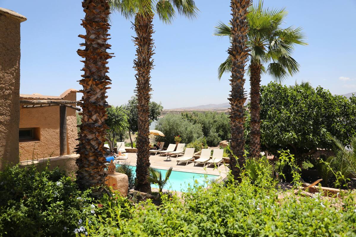 2 outdoor pools, pool umbrellas, pool loungers