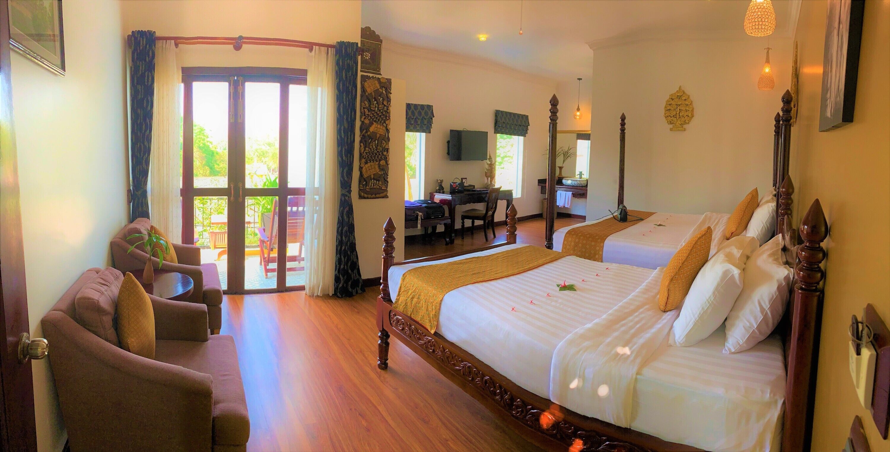 Deluxe Family Room | In-room safe, individually decorated, individually furnished, desk