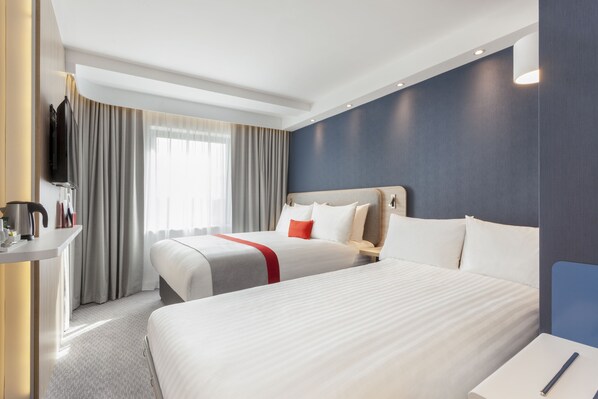 A hotel room with two beds, a desk, and a TV. - Holiday Inn Express St. Albans - M25, Jct.22 by IHG (St Albans)