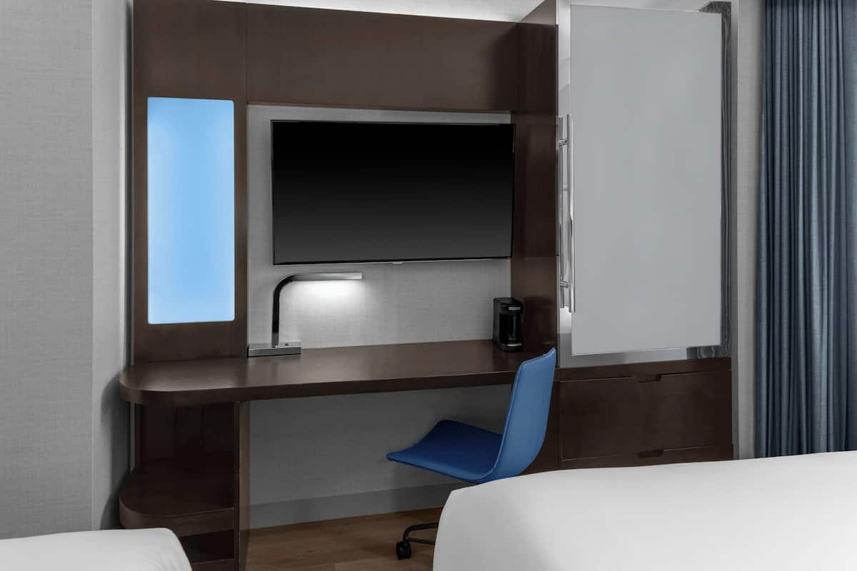 Premium bedding, down comforters, pillowtop beds, in-room safe
