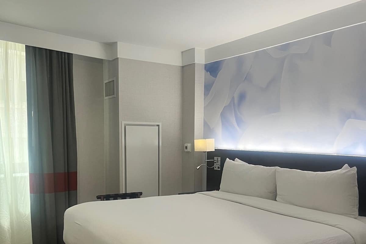 Premium bedding, down comforters, pillowtop beds, in-room safe