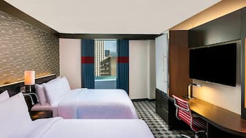 Premium bedding, down duvets, pillow-top beds, in-room safe