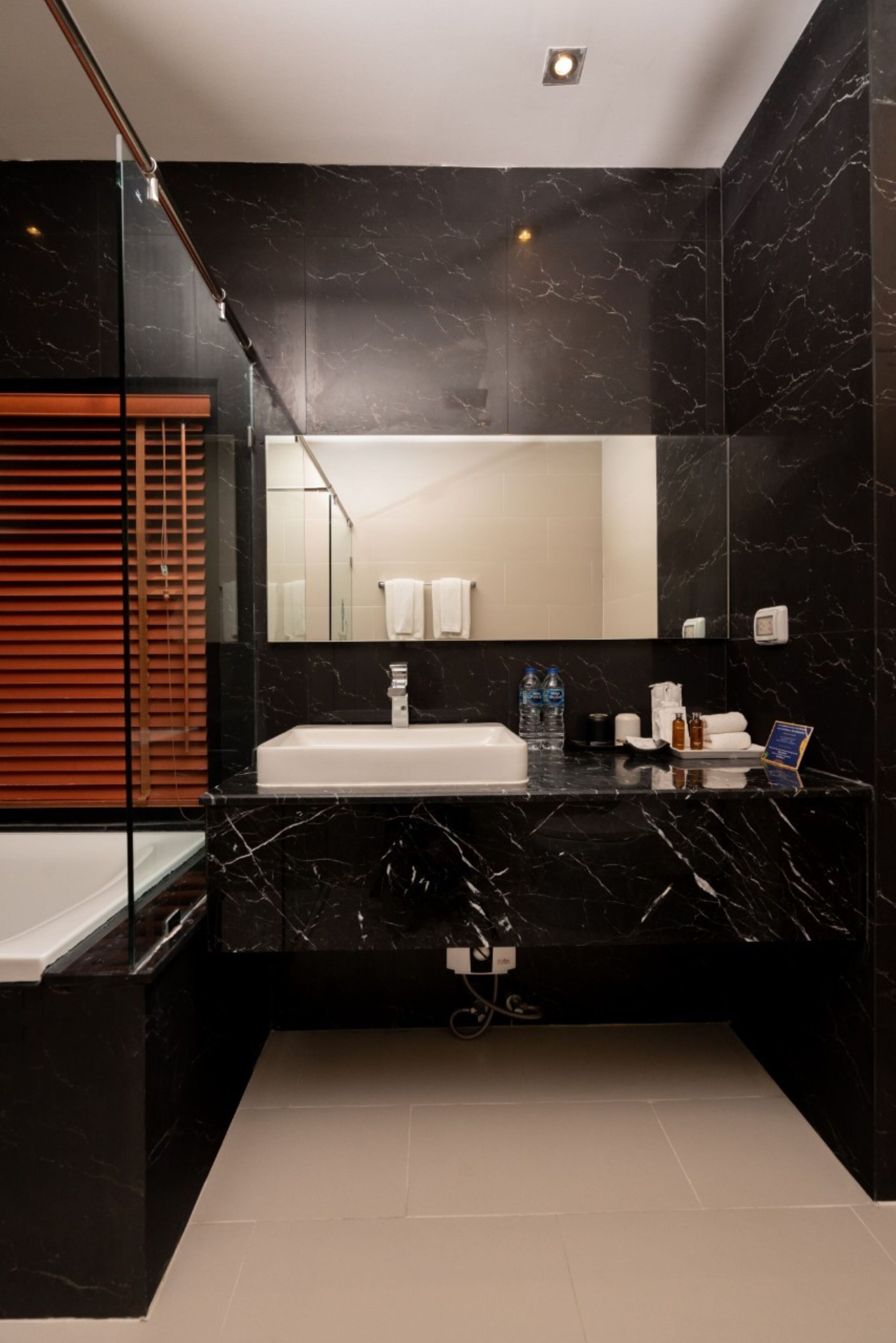executive suite | bathroom | free toiletries, hair dryer, slippers, towels