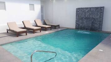 Outdoor pool, open 10:00 AM to 10:00 PM, sun loungers