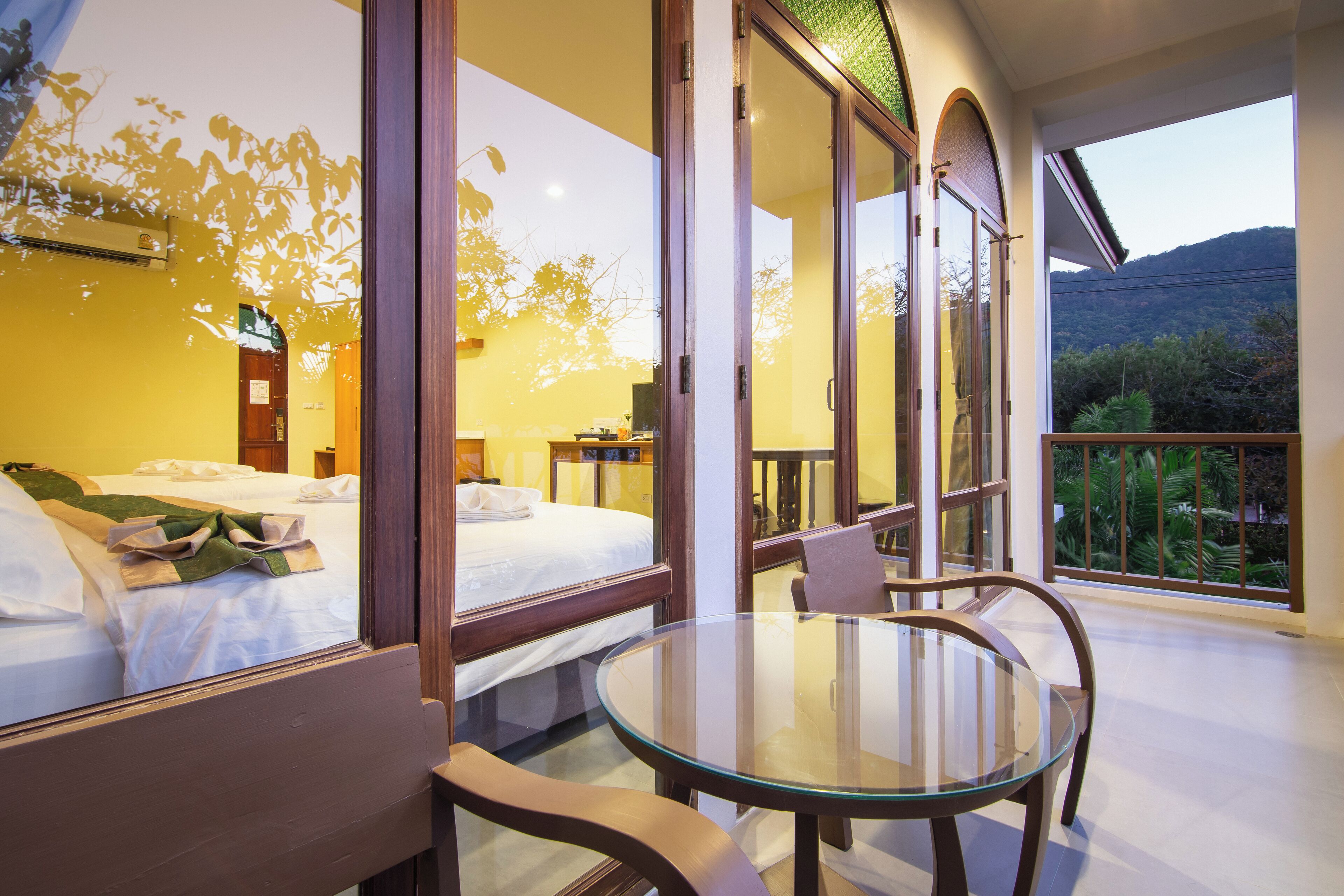 family room, 2 double beds, refrigerator, garden view | living area | flat-screen tv