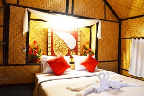 Bungalow Deluxe, 1 trĂšs grand lit | Minibar, coffre-fort, accĂšs au Wi-Fi (inclus), literie fournie