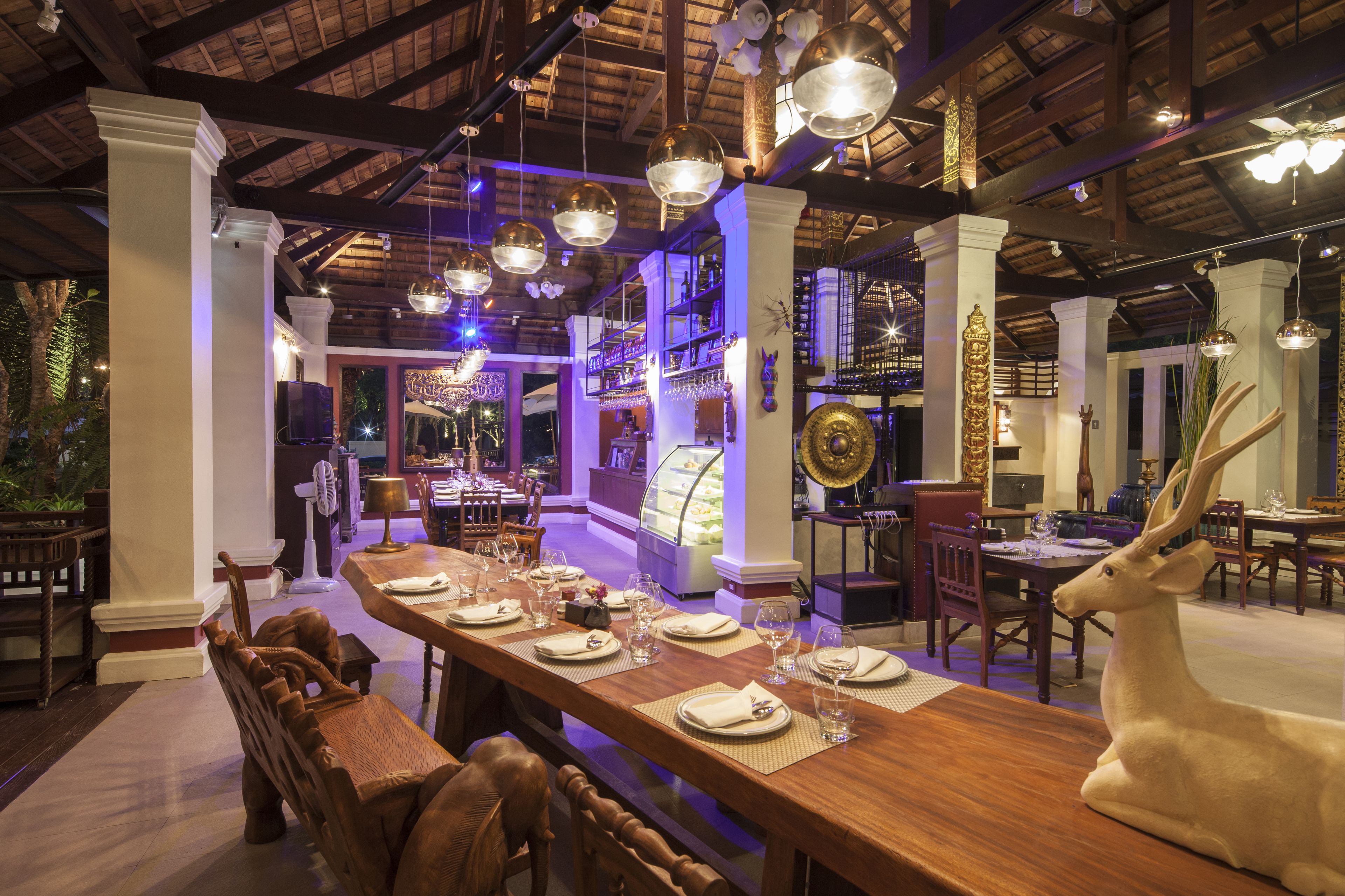 Breakfast, lunch, dinner served; international cuisine, pool views 