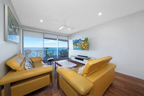 3 Bedroom East Facing Ocean View | Living area | Flat-screen TV - Salt Apartments (Yeppoon)