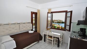 Fridge, stovetop, coffee/tea maker, cookware/dishes/utensils