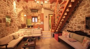 Duplex | Living area | 50-inch plasma TV with satellite channels, TV, fireplace - Lithos Traditional Houses (Sitia)