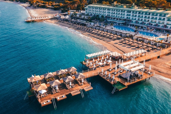 Private beach, beach shuttle, beach cabanas, sun loungers