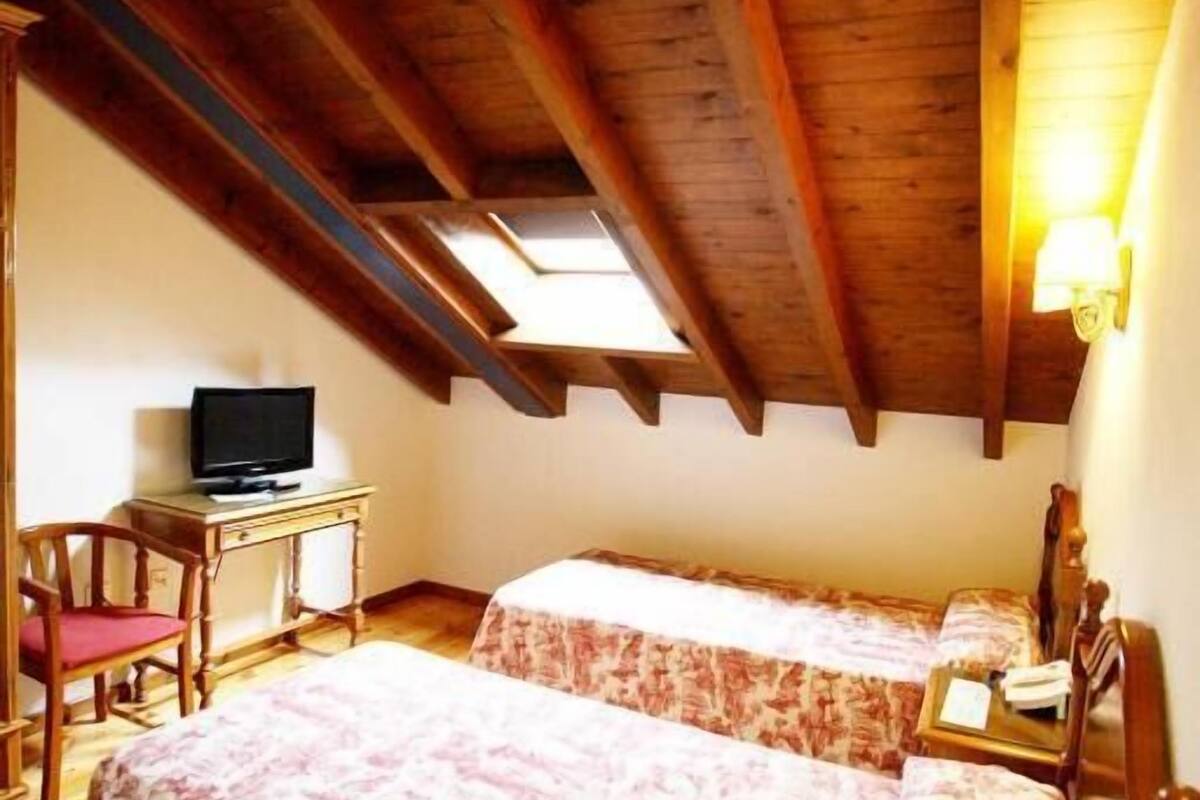 desk, blackout curtains, free wifi, bed sheets