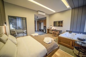 Habitación exclusiva | Ropa de cama de alta calidad, minibar, caja fuerte y escritorio