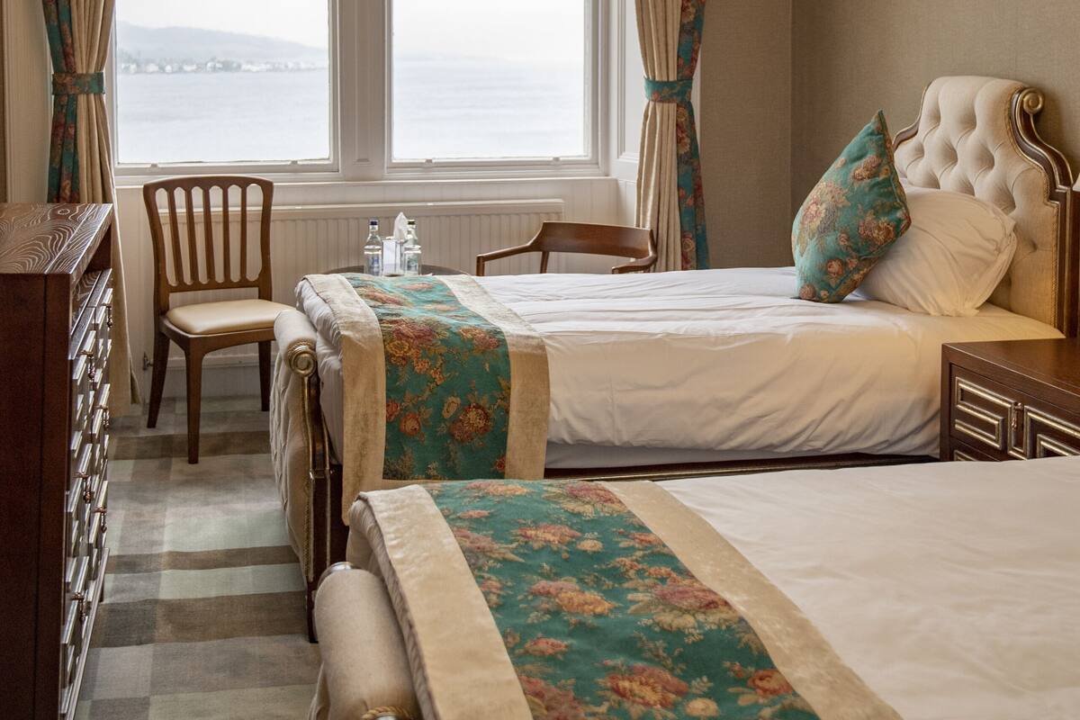 superior twin room, sea view | desk, iron/ironing board, free wifi, bed sheets