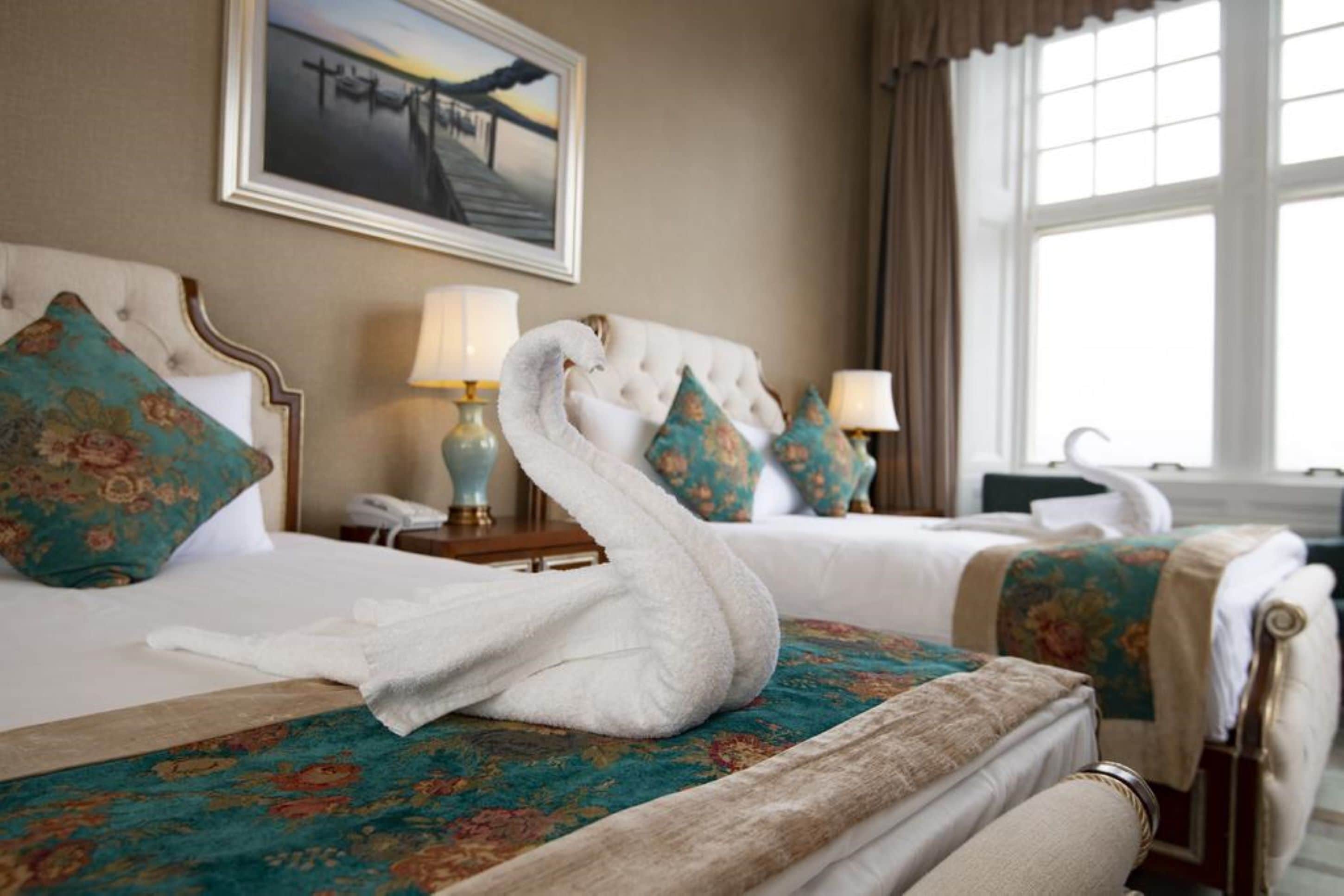 family quadruple room, sea view | desk, iron/ironing board, free wifi, bed sheets