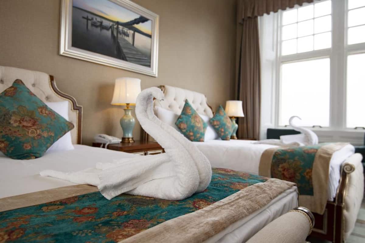 family quadruple room, sea view | desk, iron/ironing board, free wifi, bed sheets