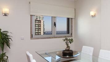 Apartment, 2 Bedrooms | Living room | Flat-screen TV