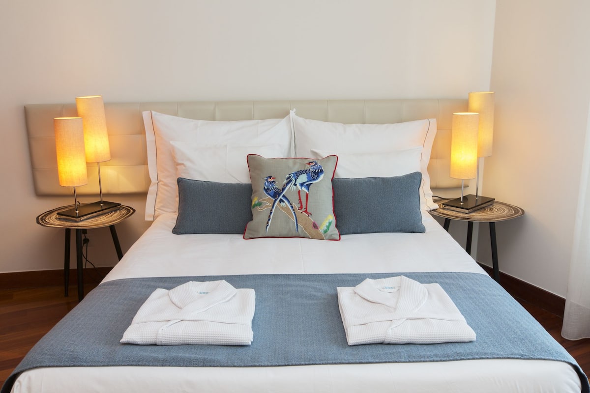 Apartment, 1 Bedroom | 3 bedrooms, down comforters, desk, iron/ironing board