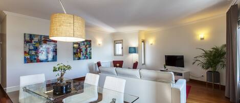 Family Apartment, 3 Bedrooms, City View | Living room | Flat-screen TV