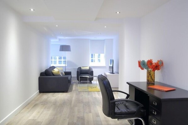 Apartment, 2 Bedrooms | Living area | Flat-screen TV