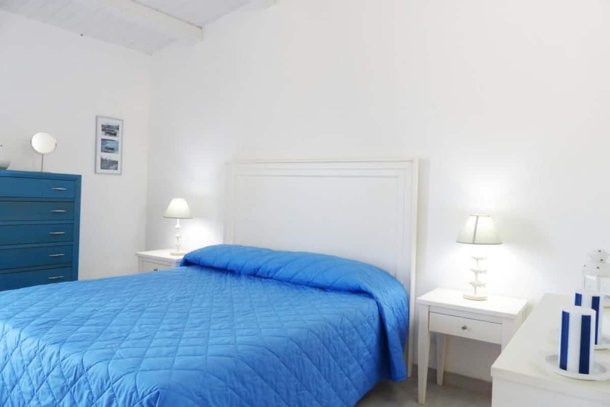 Ropa de cama de alta calidad y tabla de planchar con plancha