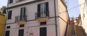 Stunning Sunrise building with a charming facade and inviting balconies.