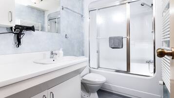 Eco-friendly toiletries, hair dryer, towels