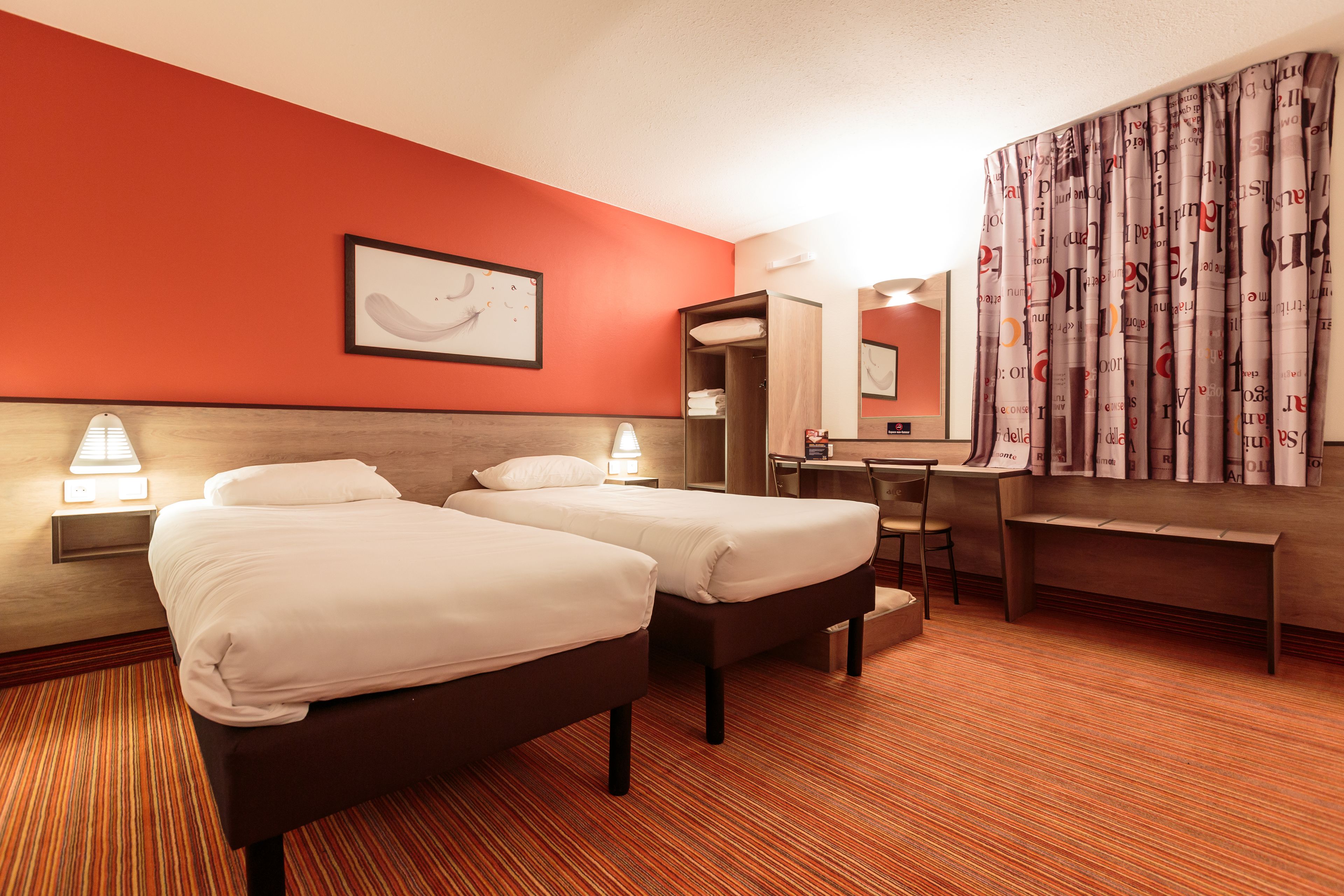 twin room | premium bedding, tempur-pedic beds, desk, blackout curtains