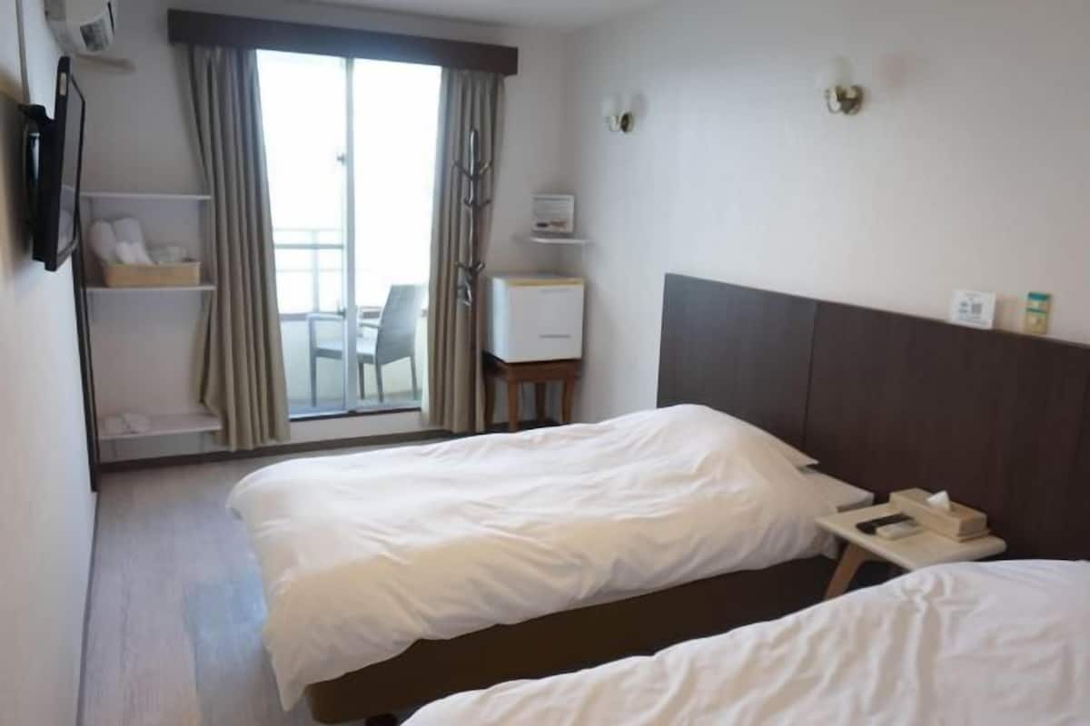 Blackout curtains, iron/ironing board, free WiFi, bed sheets