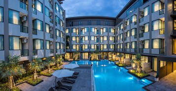 Outdoor pool, open 7:00 AM to 9:00 PM, sun loungers