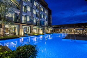 Outdoor pool, open 7:00 AM to 9:00 PM, sun loungers