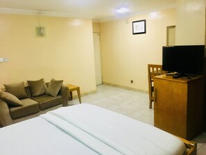 Standard Room, 1 Double Bed | 1 bedroom, in-room safe, individually furnished, desk