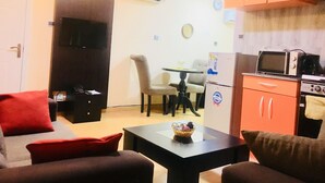 Classic Apartment, 1 Bedroom | Living area | 32-inch LCD TV with cable channels, TV - Hillside Gardens (Lagos)