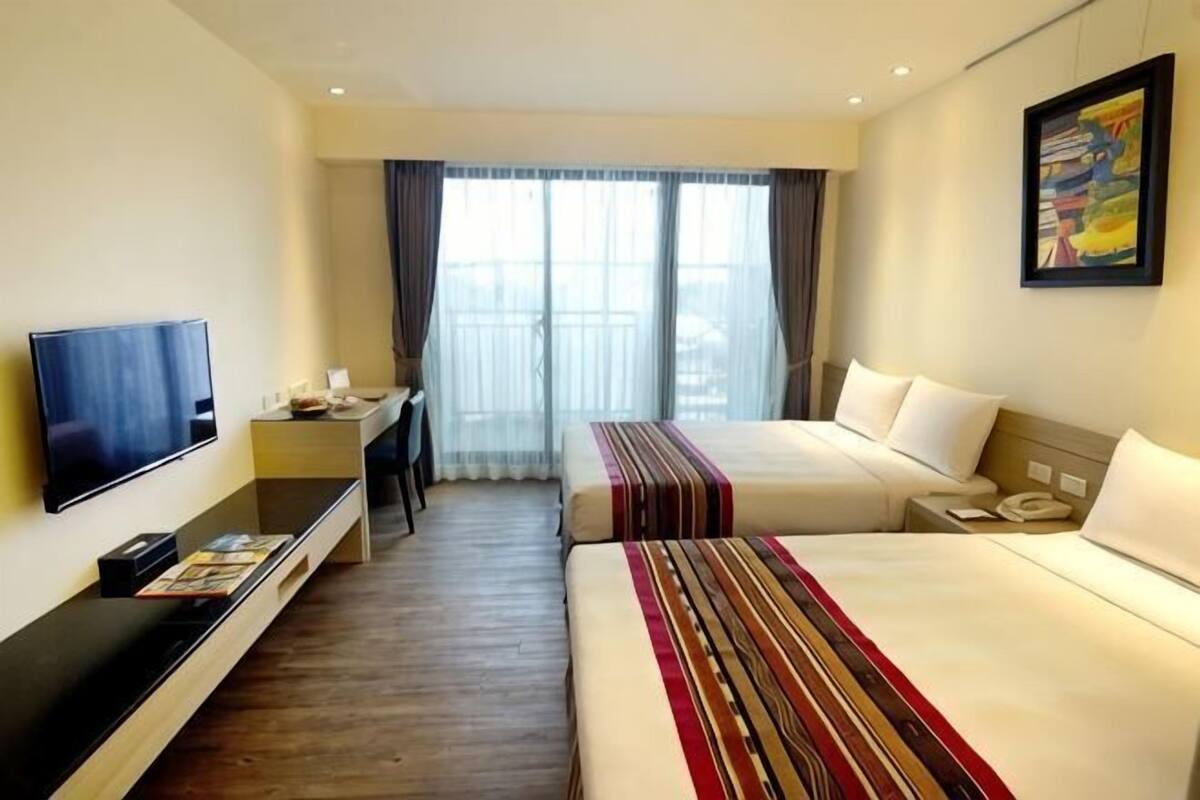Free minibar, in-room safe, desk, blackout curtains