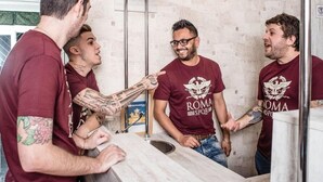 A group of people in a bathroom with marble countertops and a sink. - Hostel Beautiful (Rome)