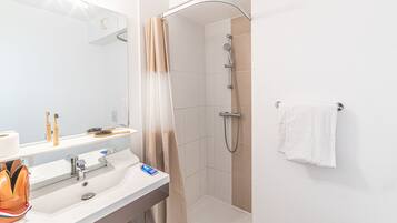 Shower, free toiletries, hair dryer, towels