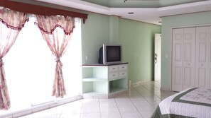 Family Suite, 2 Queen Beds | Desk, iron/ironing board, free WiFi