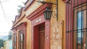 A building with a sign reading "HOTEL AZUCENAS". - Hotel Azucena (Oaxaca)