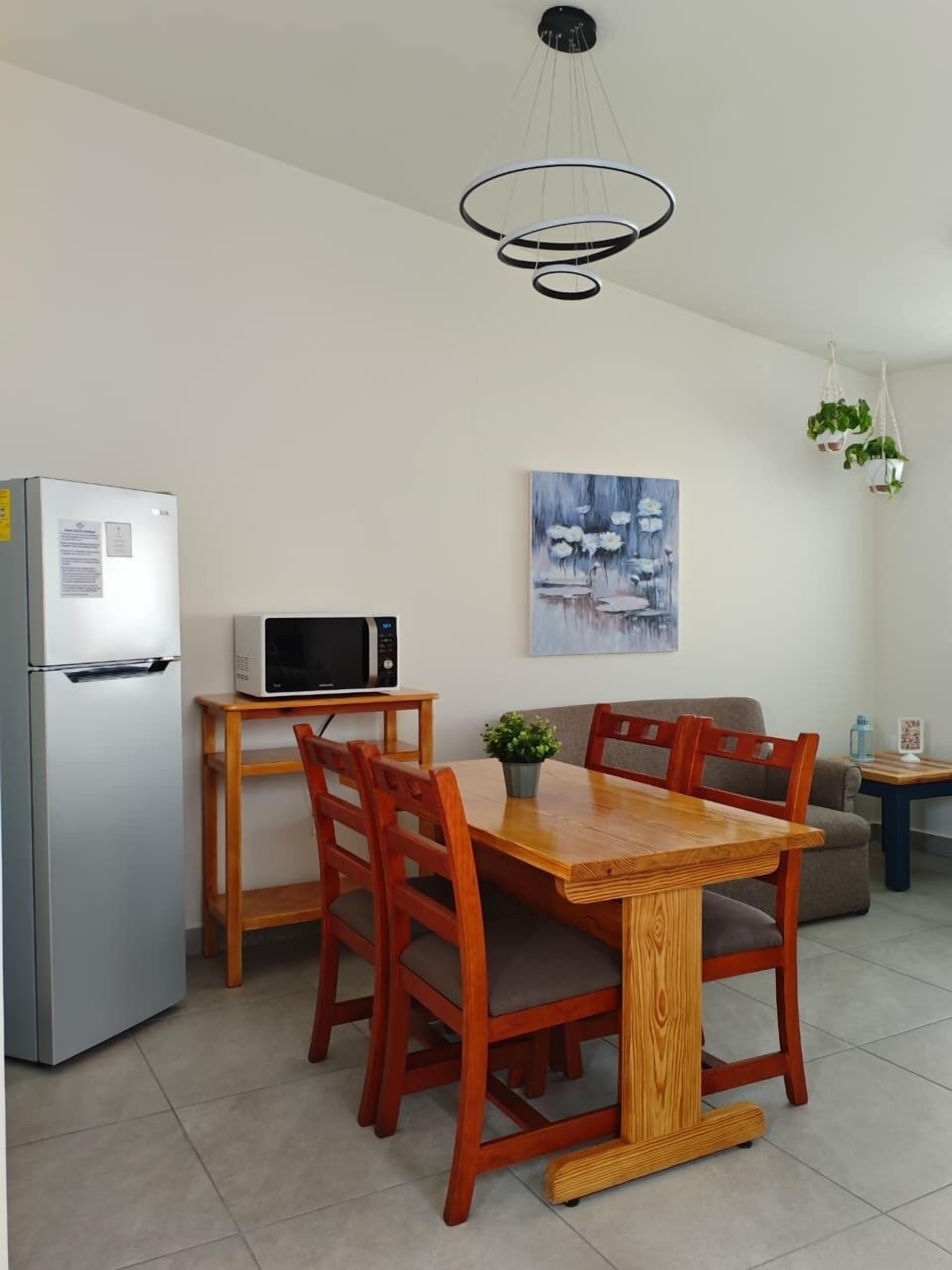 Departamento estándar, 1 habitación, cocina | Área de sala de estar | Televisión de pantalla plana de 32 pulgadas con canales por cable 